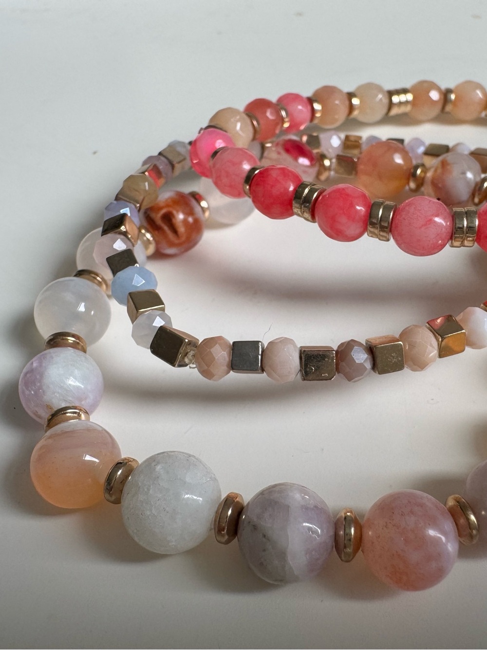 3 Pink and Peach Beaded Stretchy Bracelets